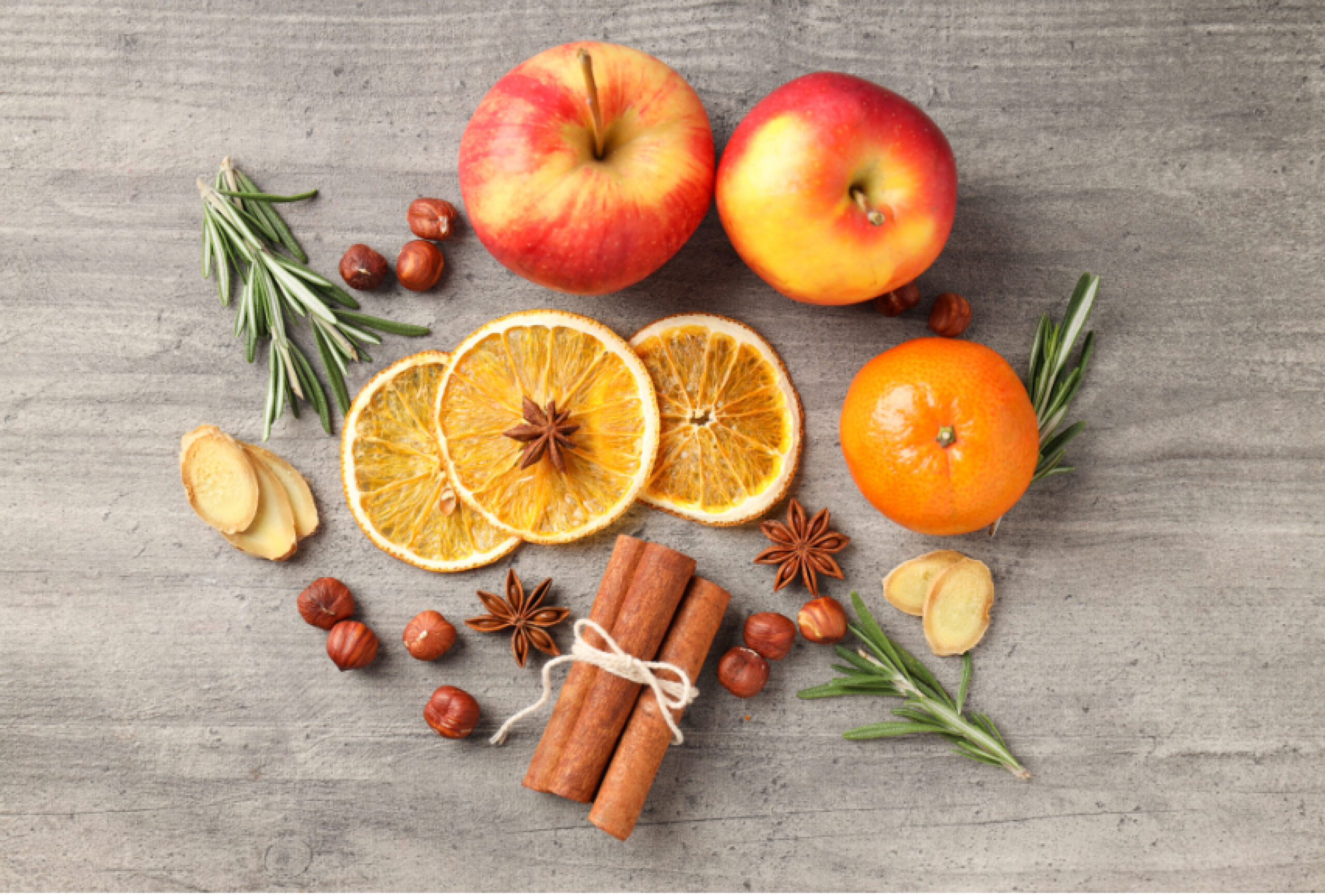 Mulled wine ingredients and preparation, styled with festive decor