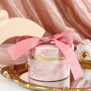 Elegant round gift box, perfect for holding handcrafted tea spheres or other premium gifts.